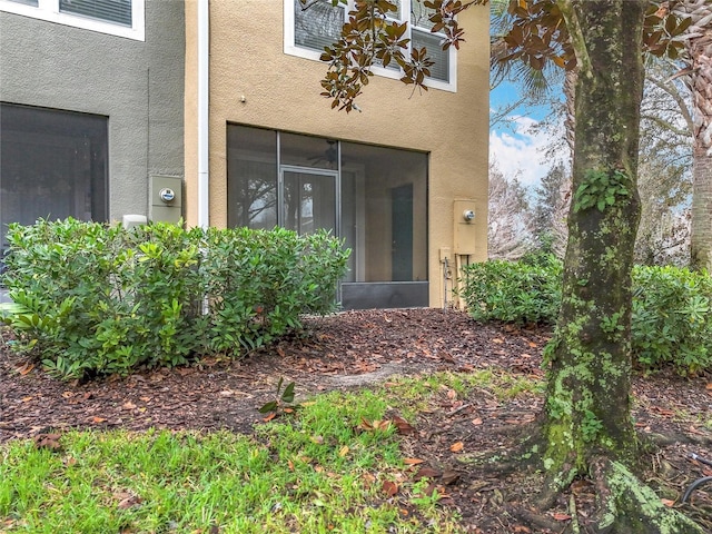 1410 Stockton Dr, Sanford, FL 32771 - view of exterior entry featuring stucco siding