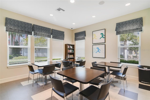 dining area featuring recessed lighting, a healthy amount of sunlight, visible vents, and baseboards