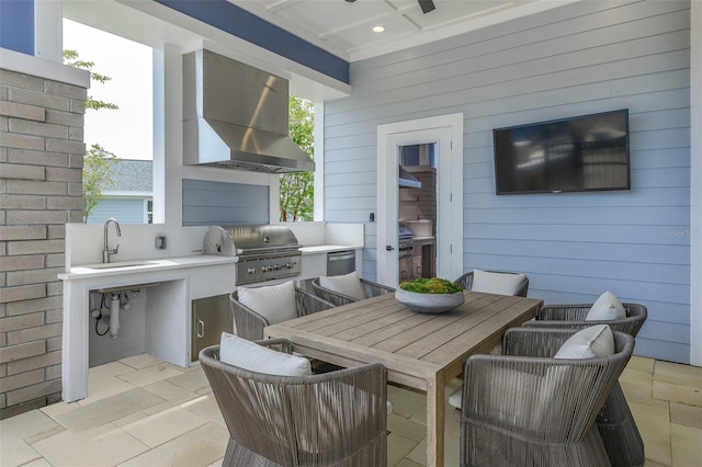 view of patio / terrace with outdoor dining space, a sink, grilling area, and area for grilling