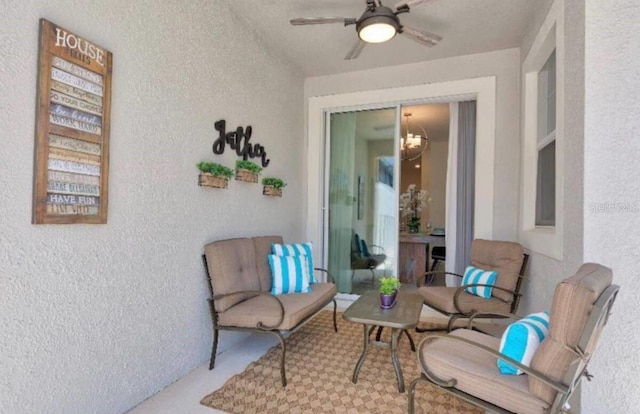 view of patio / terrace featuring ceiling fan