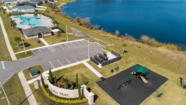 birds eye view of property featuring a water view