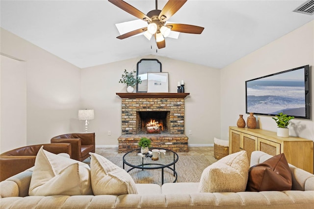 living area with a ceiling fan, visible vents, baseboards, vaulted ceiling, and a brick fireplace