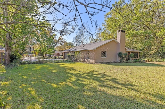 view of yard with fence