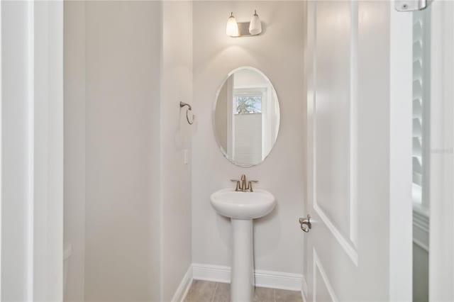 half bath with baseboards