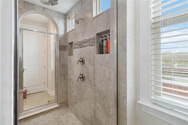 bathroom with a shower stall