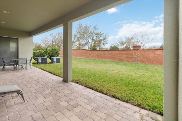 view of patio featuring central AC unit and a fenced backyard