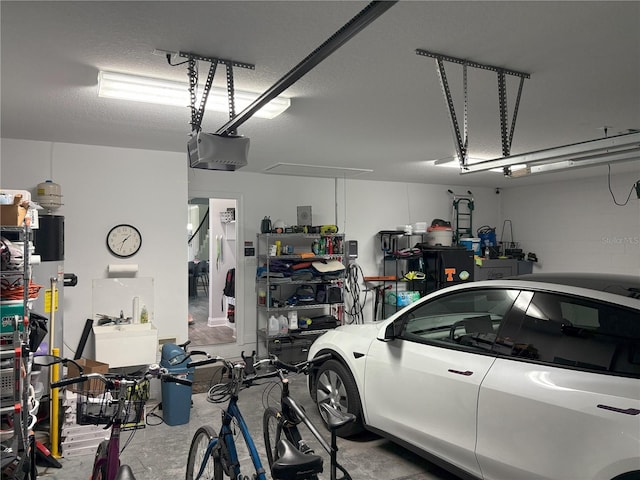 garage featuring a garage door opener