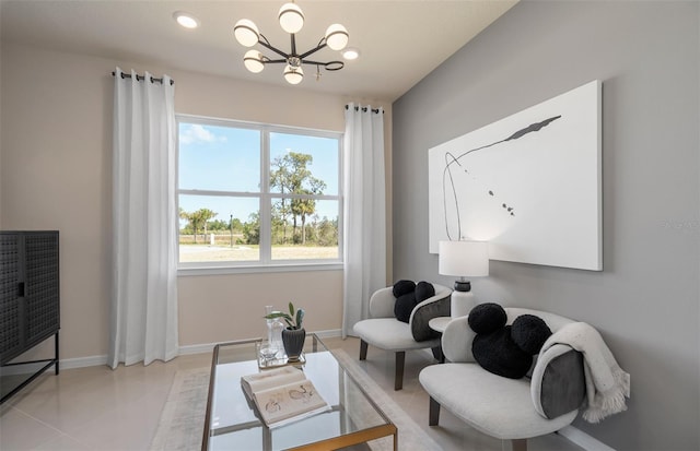 sitting room with recessed lighting, a notable chandelier, baseboards, and light tile patterned floors