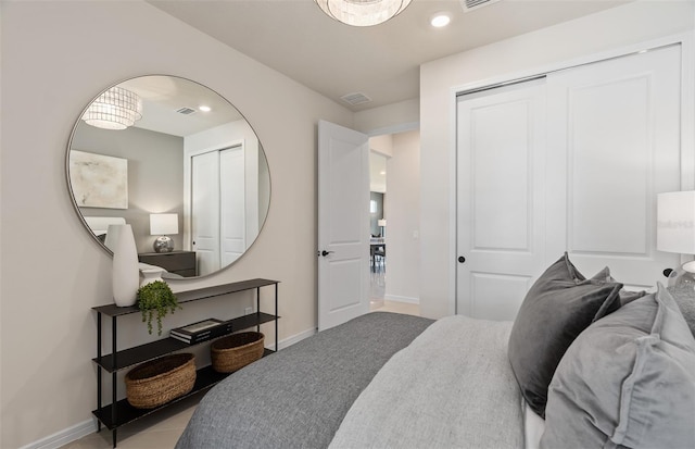 bedroom with recessed lighting, visible vents, and baseboards