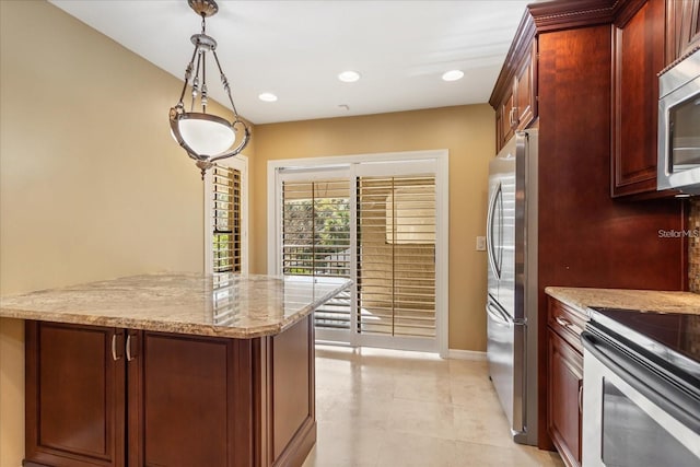 kitchen featuring light tile patterned floors, recessed lighting, appliances with stainless steel finishes, light stone countertops, and pendant lighting