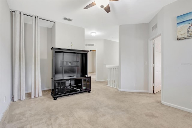 living room with light colored carpet and visible vents