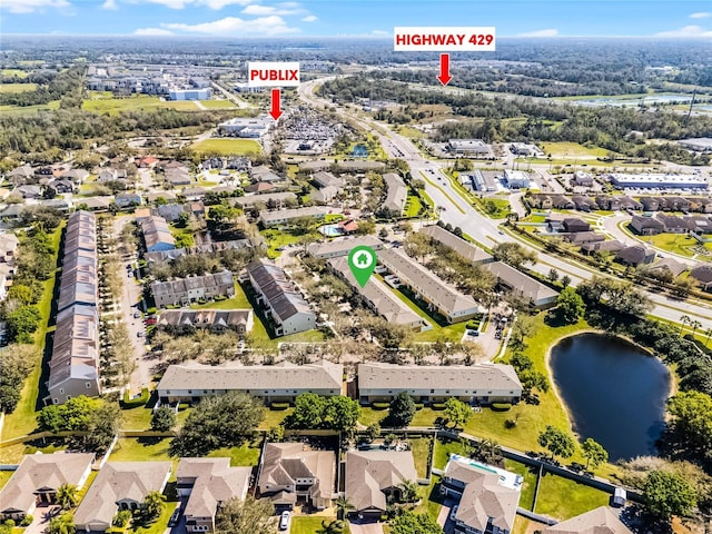 aerial view featuring a water view and a residential view