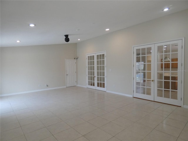 unfurnished room with french doors, recessed lighting, and baseboards