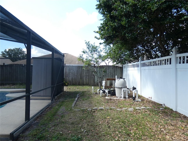 view of yard with a fenced backyard and an outdoor pool