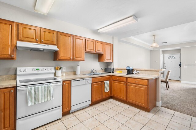 kitchen with light countertops, light carpet, a sink, white appliances, and under cabinet range hood