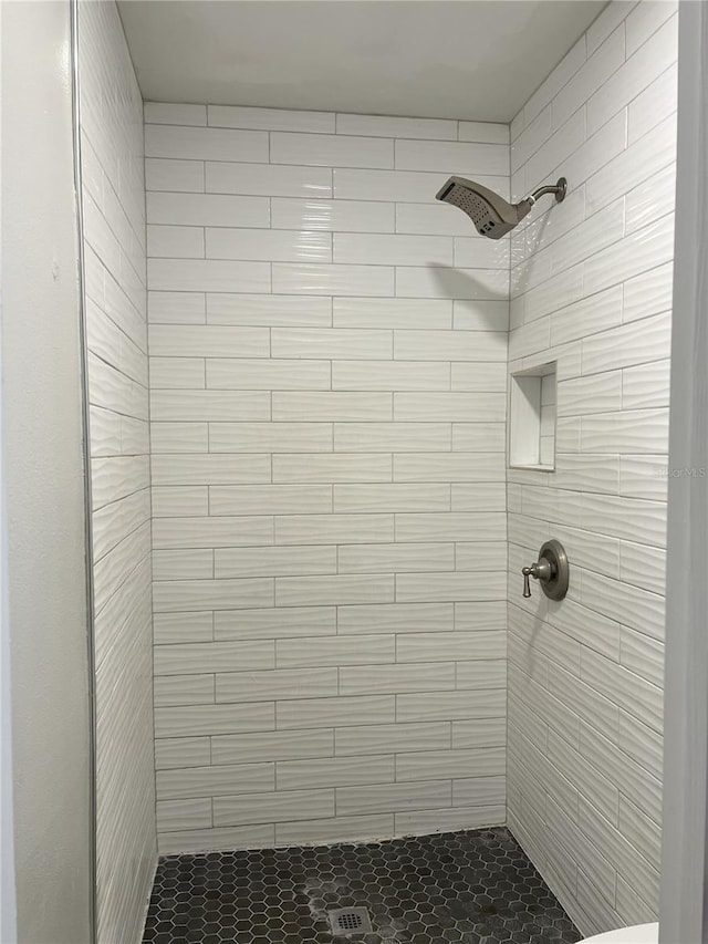 bathroom featuring a stall shower