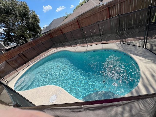 view of pool with a fenced in pool and a fenced backyard