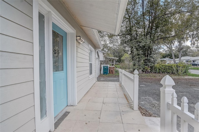 view of home's exterior with fence