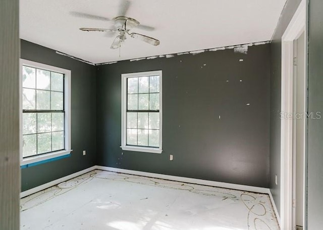 106 Thurston Pl, Crestview, FL 32536 - empty room with baseboards, plenty of natural light, and a ceiling fan