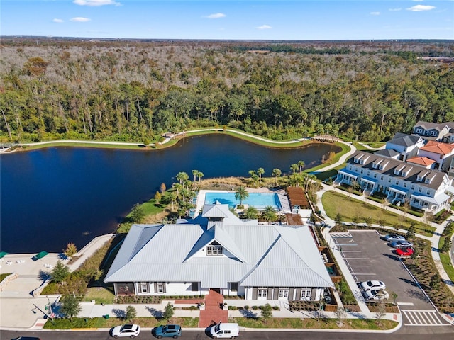 bird's eye view featuring a water view and a view of trees