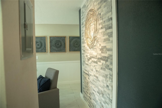 bathroom featuring wainscoting and wood finished floors