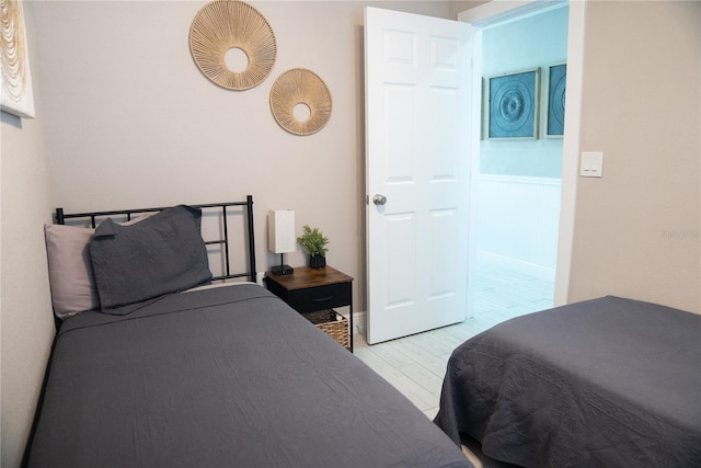 bedroom featuring light wood-style flooring