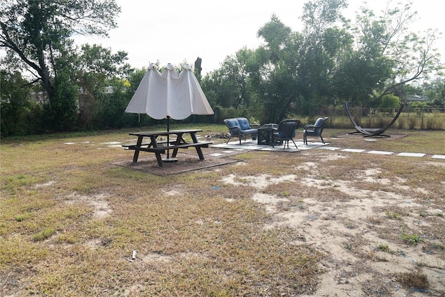 view of yard with a patio and fence