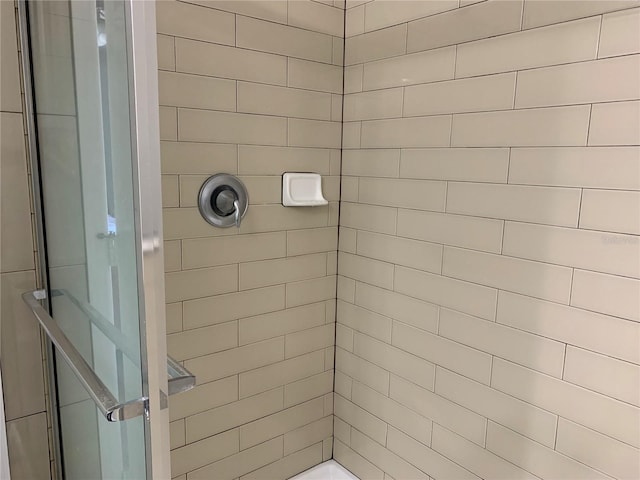 bathroom featuring a stall shower