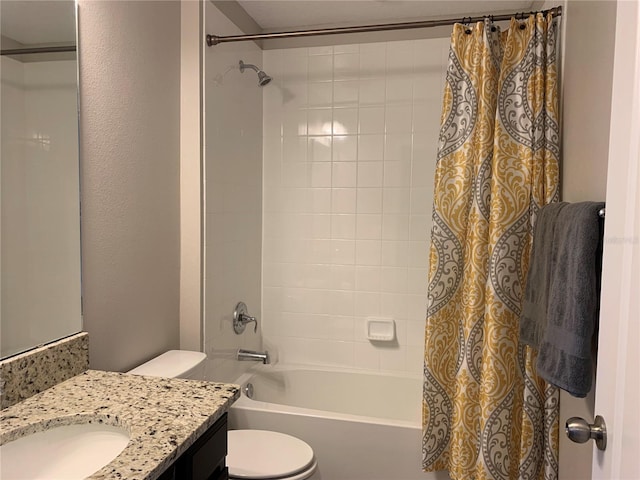 bathroom featuring vanity, toilet, and shower / tub combo with curtain