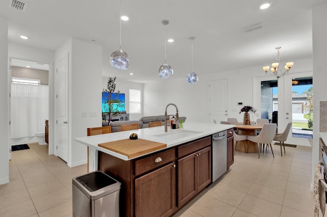 kitchen with visible vents, dishwasher, light countertops, a sink, and recessed lighting