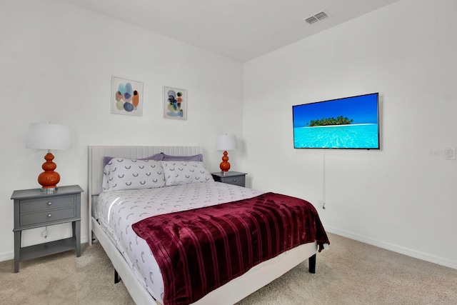 bedroom featuring carpet, visible vents, and baseboards