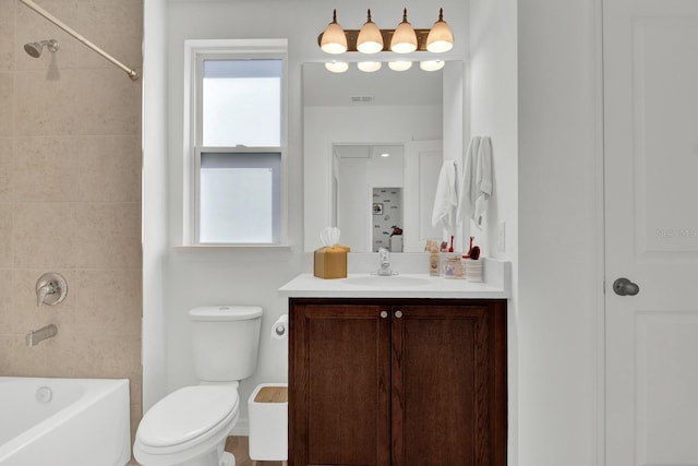 full bath with shower / bathtub combination, plenty of natural light, vanity, and toilet