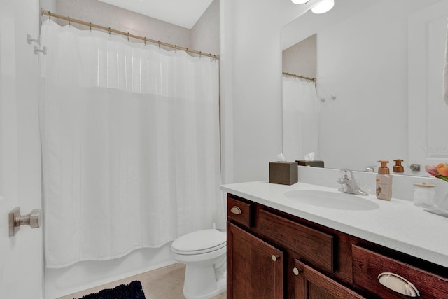 bathroom with vanity, toilet, and shower / tub combo with curtain