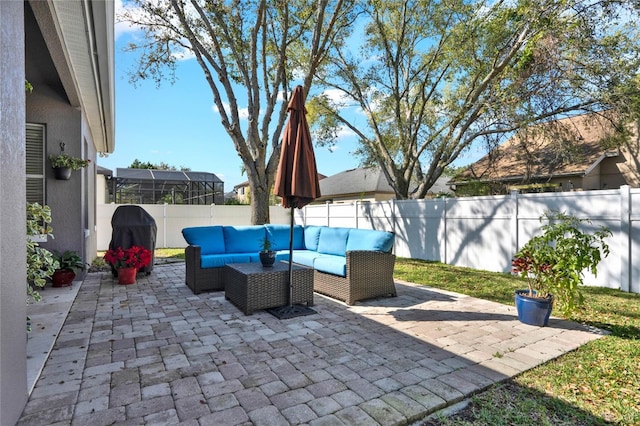 view of patio featuring a fenced backyard and an outdoor living space