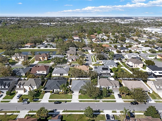 birds eye view of property with a residential view