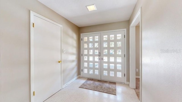 doorway with baseboards