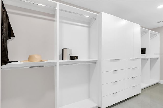 walk in closet featuring visible vents