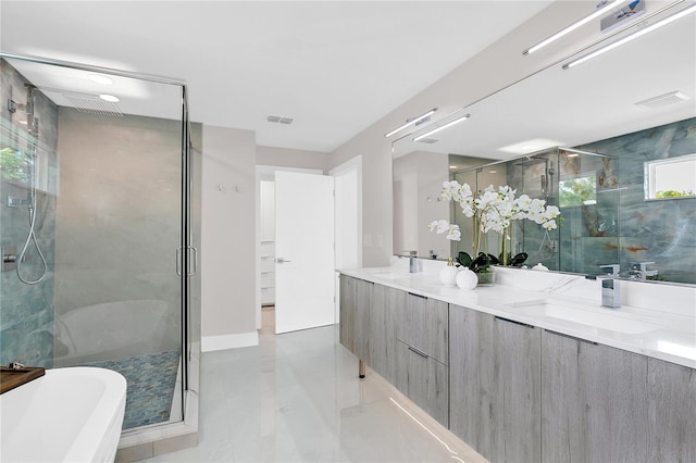 full bathroom with a stall shower, visible vents, and a sink