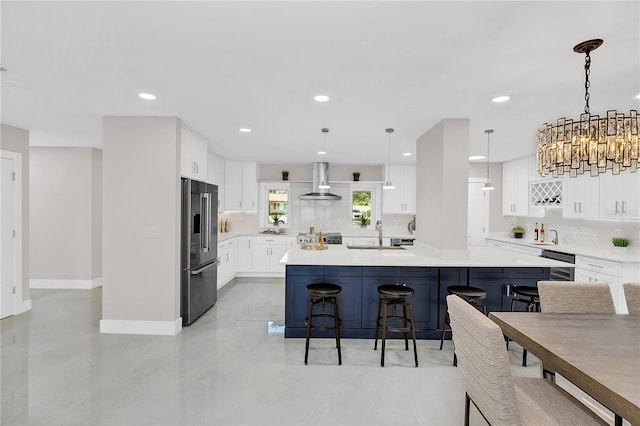 2015 Summerfield Rd, Winter Park, FL 32792 - kitchen featuring high end refrigerator, backsplash, a breakfast bar, light countertops, and recessed lighting