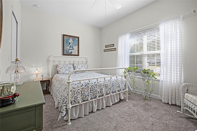 bedroom with carpet and a ceiling fan