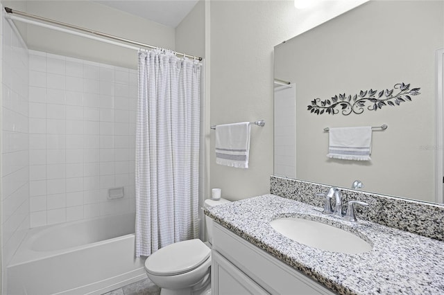 full bathroom featuring shower / bath combo with shower curtain, vanity, and toilet