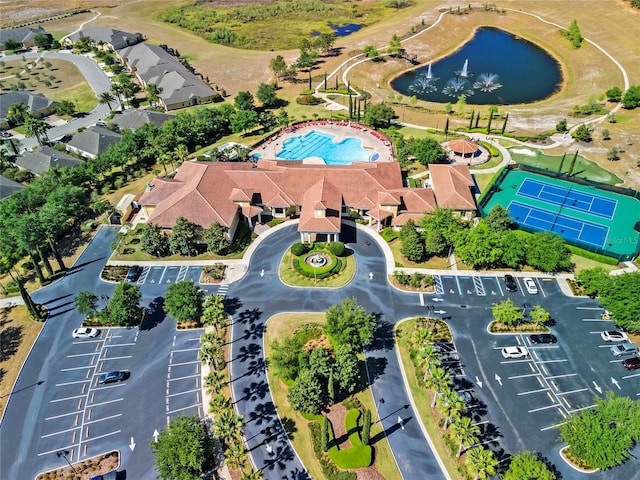 bird's eye view featuring a water view and a residential view