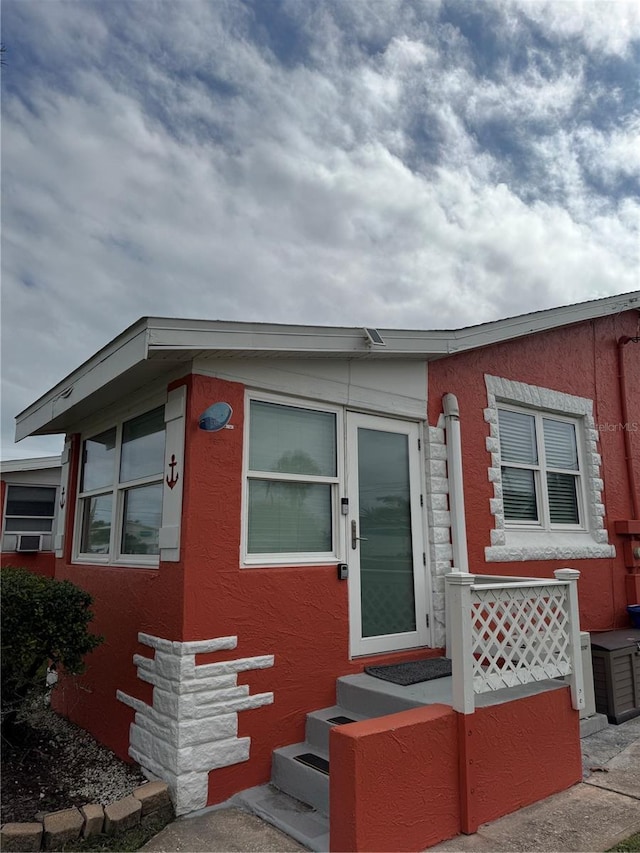 manufactured / mobile home with stucco siding