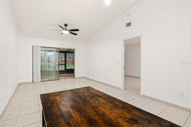 unfurnished room with a ceiling fan, visible vents, baseboards, and light tile patterned floors