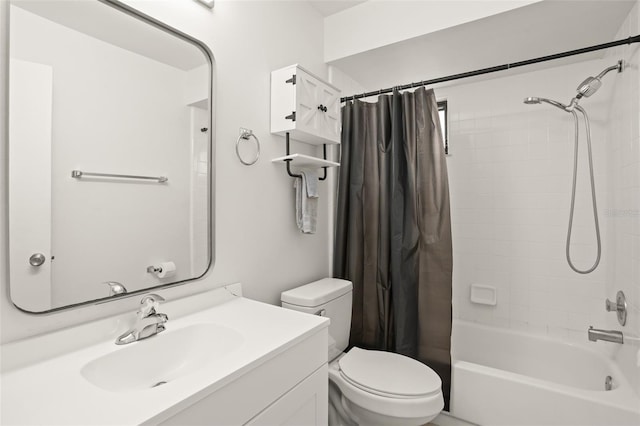 full bath featuring shower / bath combo, vanity, and toilet