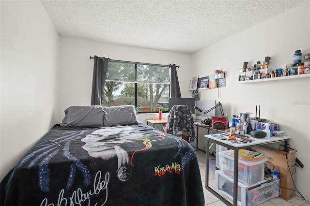 bedroom featuring a textured ceiling