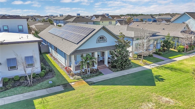 drone / aerial view featuring a residential view