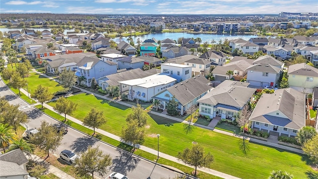 aerial view featuring a water view and a residential view