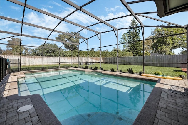 view of swimming pool featuring a fenced in pool, a fenced backyard, and glass enclosure