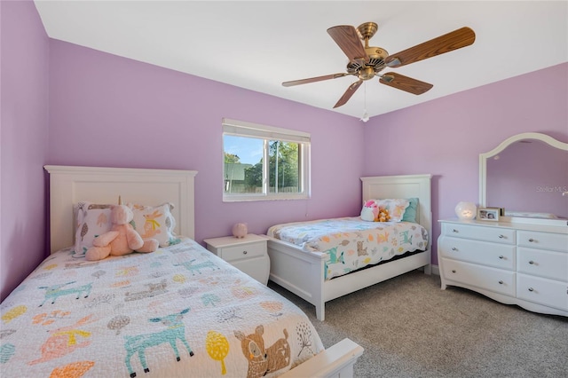 bedroom featuring ceiling fan and carpet floors